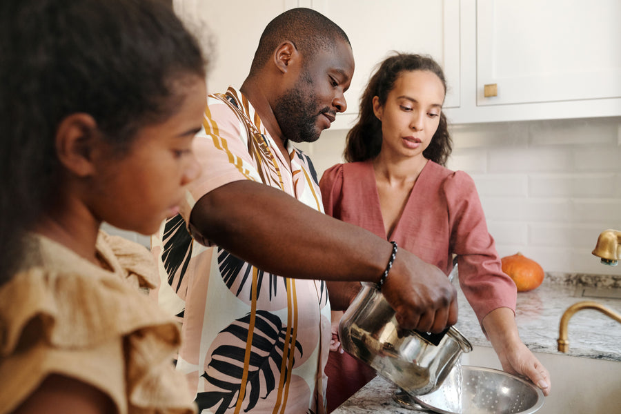 Editorial photograph featuring food, seasoning or shared home cooking