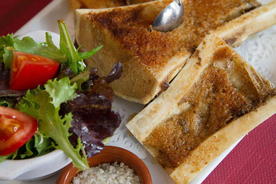 Roasted bone marrow with toast and crispy shallots